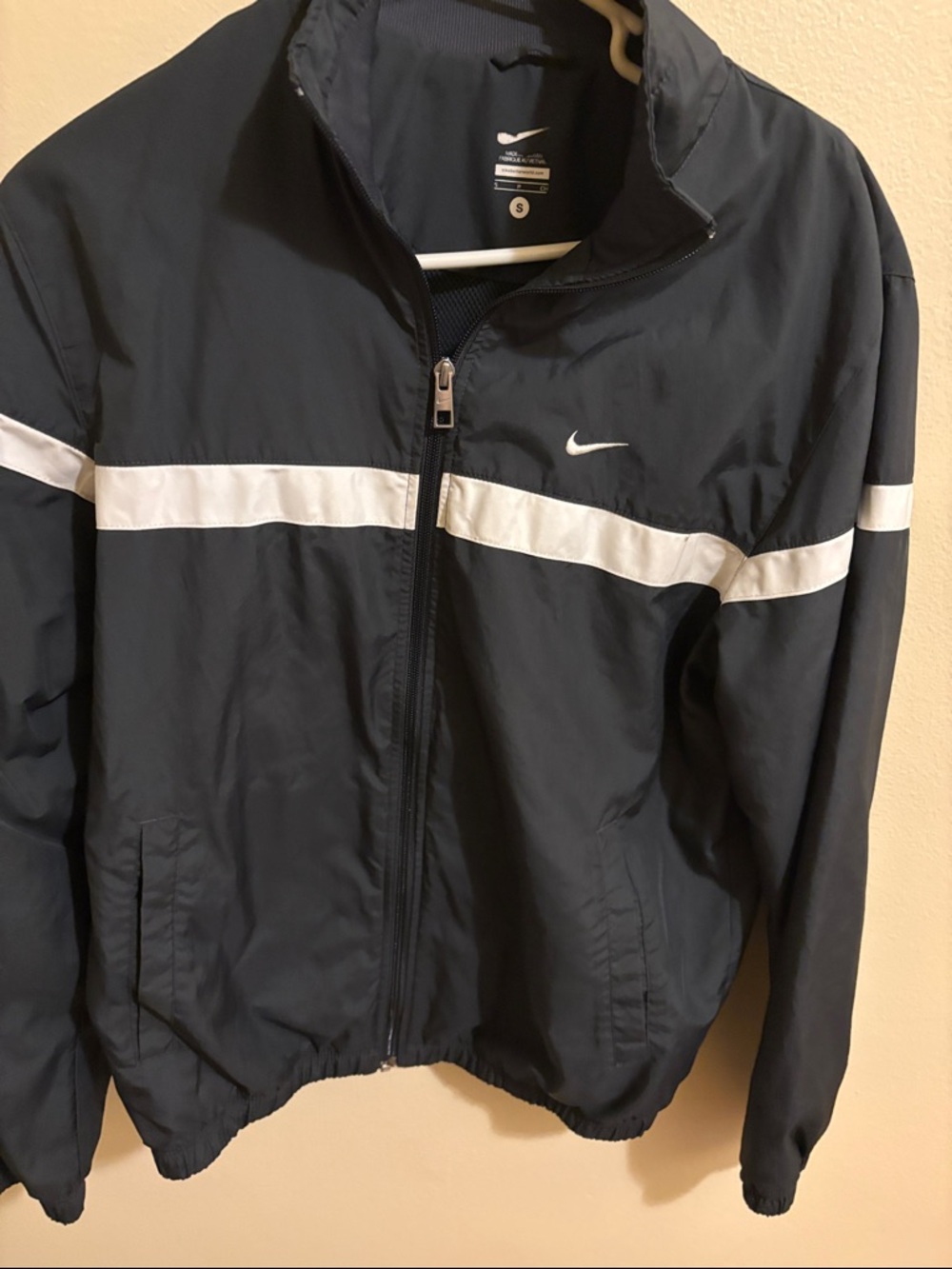 Nike women’s Black Windbreaker Jacket with White Stripe